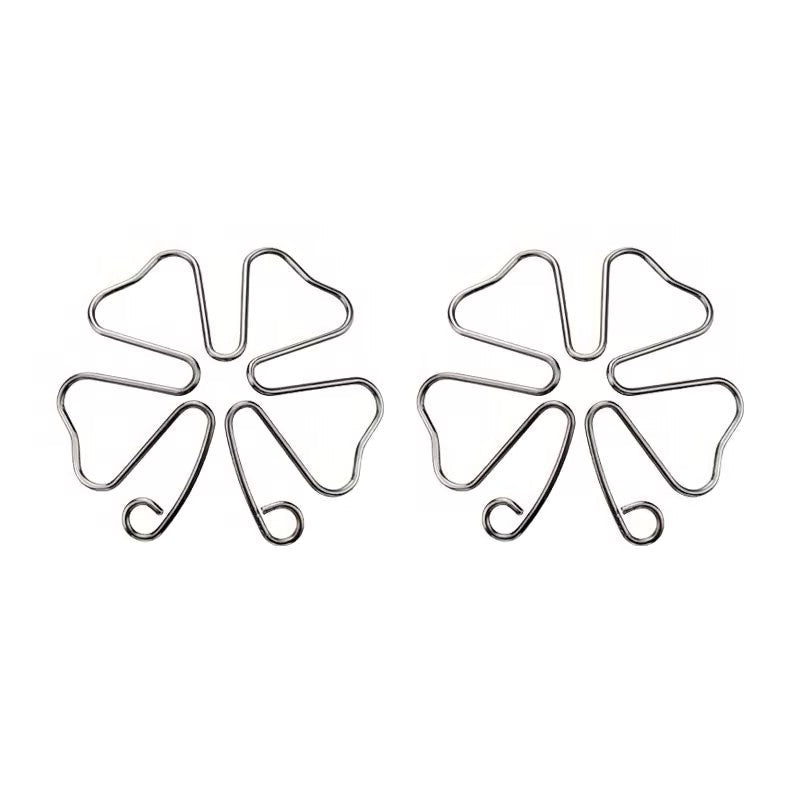 A pair of symmetrical silver wire floral non-pierced body jewelry clips showing adjustable loops.