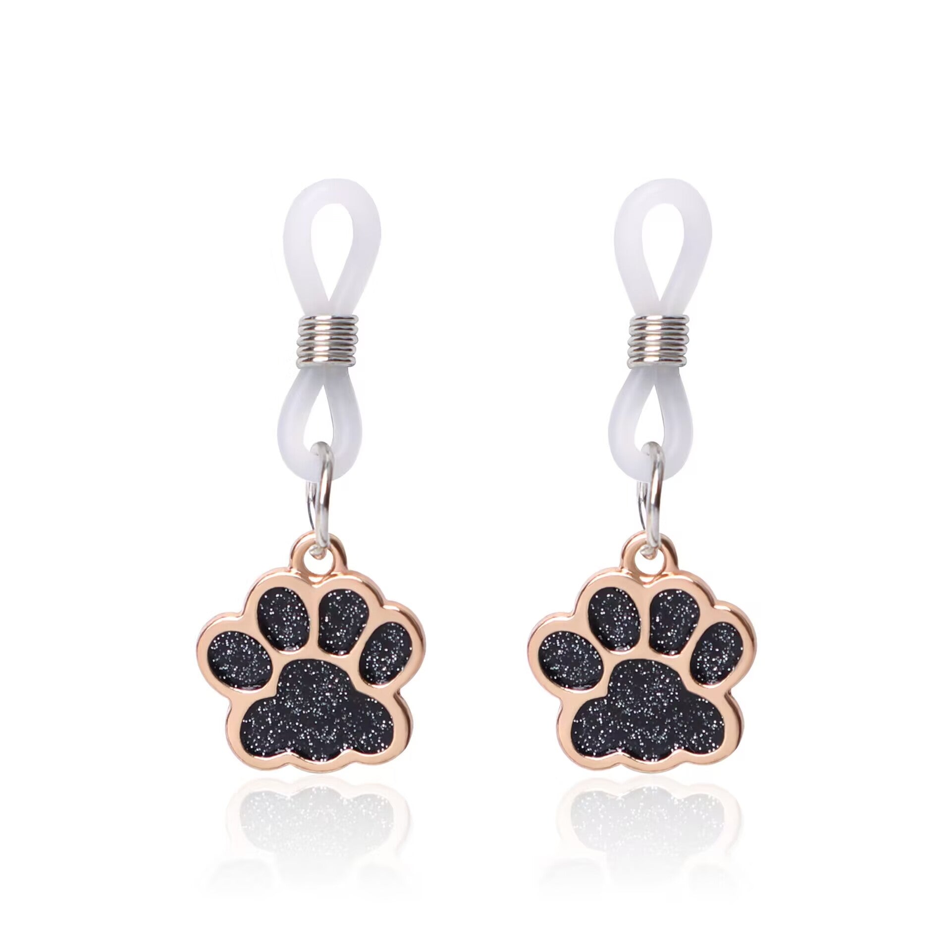 A pair of black shimmering paw print non-pierced nipple accessories with clear loops.
