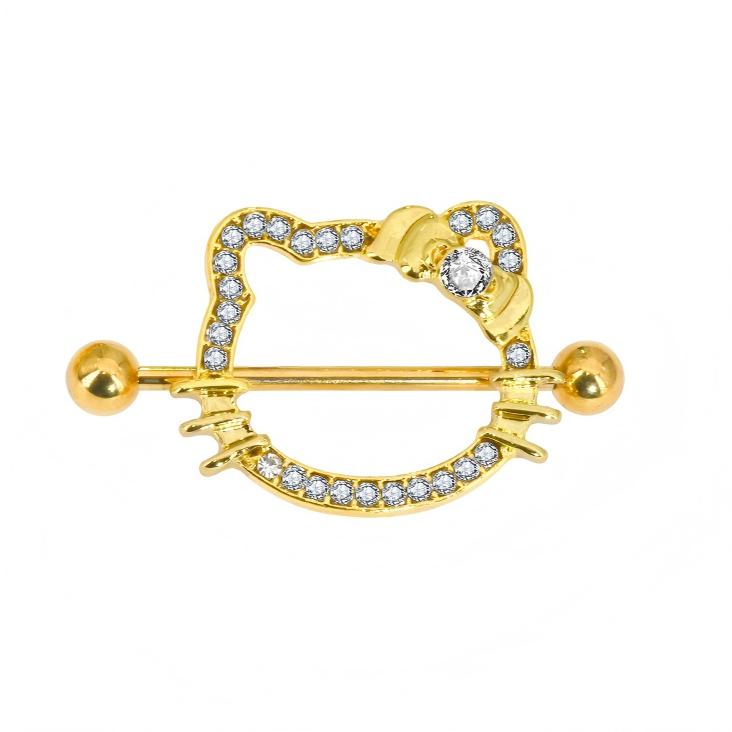 Close-up of a gold-toned feline nipple shield adorned with brilliant rhinestone accents.