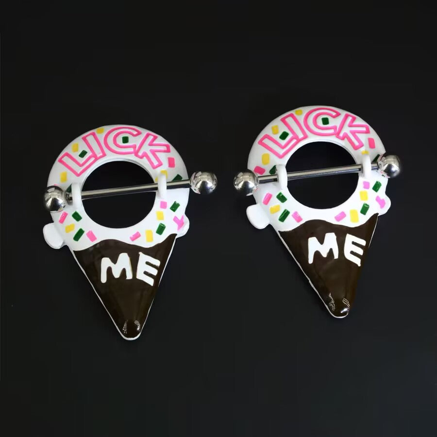 Two Lick Me ice cream nipple shields displayed on a professional black background.