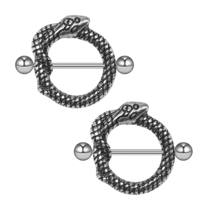 A pair of gothic style coiled serpent nipple shield rings for alternative fashion.
