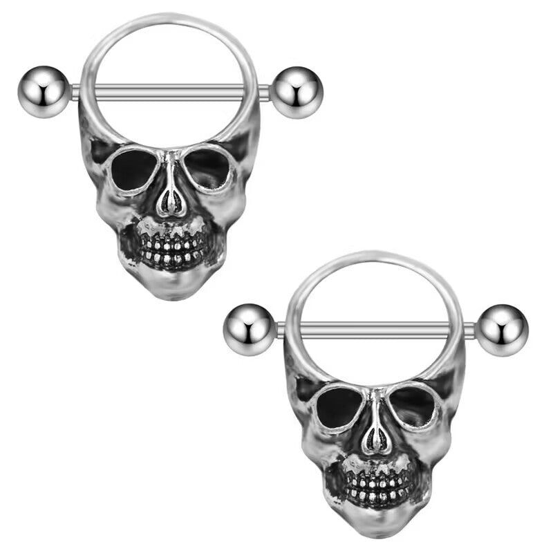 A pair of matching retro punk skull nipple shields for alternative fashion.