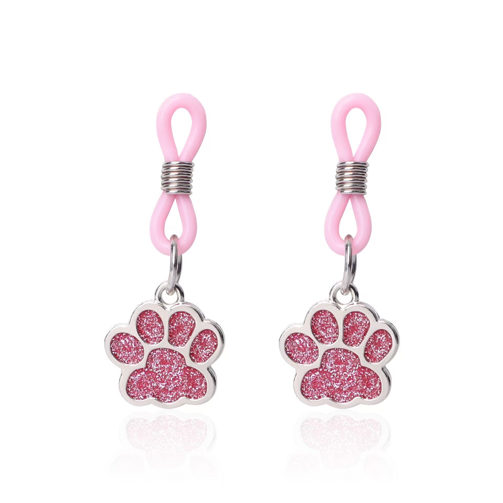Front view of a pair of pink paw print charms with adjustable tension sliders.