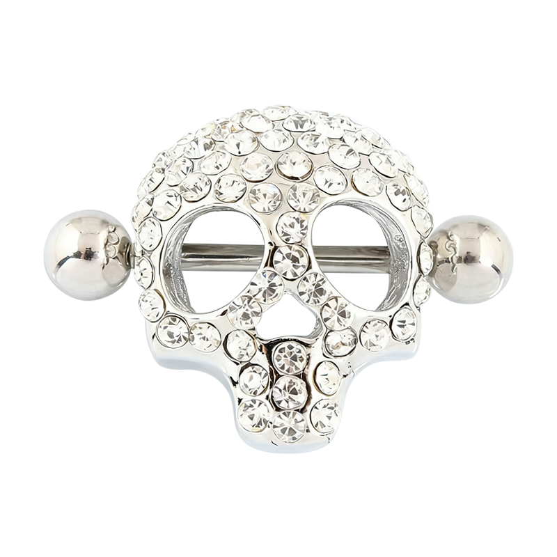 A front view of a silver-toned skull nipple shield with pave-set crystal details.